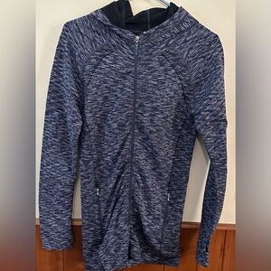 O TO S  size SMALL/MEDIUM variegated colored, long sleeved, running jacket